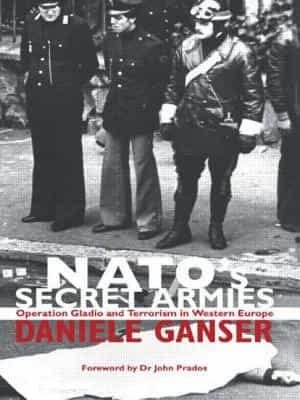 Black and white book cover titled "NATO's Secret Armies" by Daniele Ganser. The image features three men in military or police uniforms standing in a street; two are holding submachine guns, and one is speaking into a radio. Black and white book cover titled "NATO's Secret Armies" by Daniele Ganser. The image features three men in military or police uniforms standing in a street; two are holding submachine guns, and one is speaking into a radio.